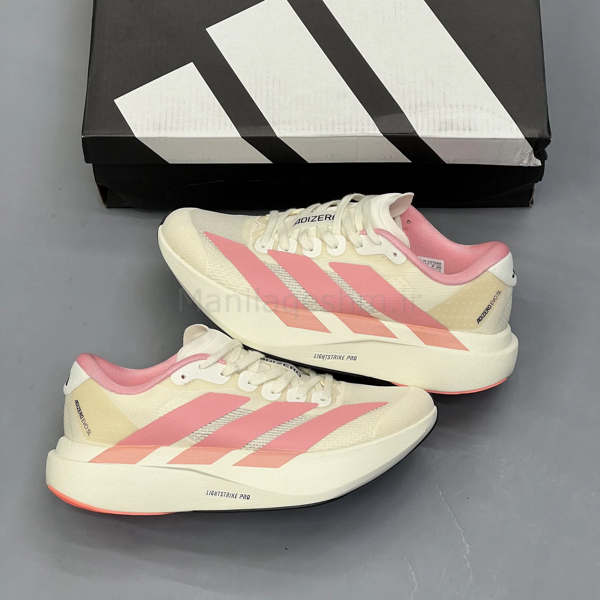 کفش آدیداس آدی زیرو کرم صورتی Adidas Adizero Evo SL