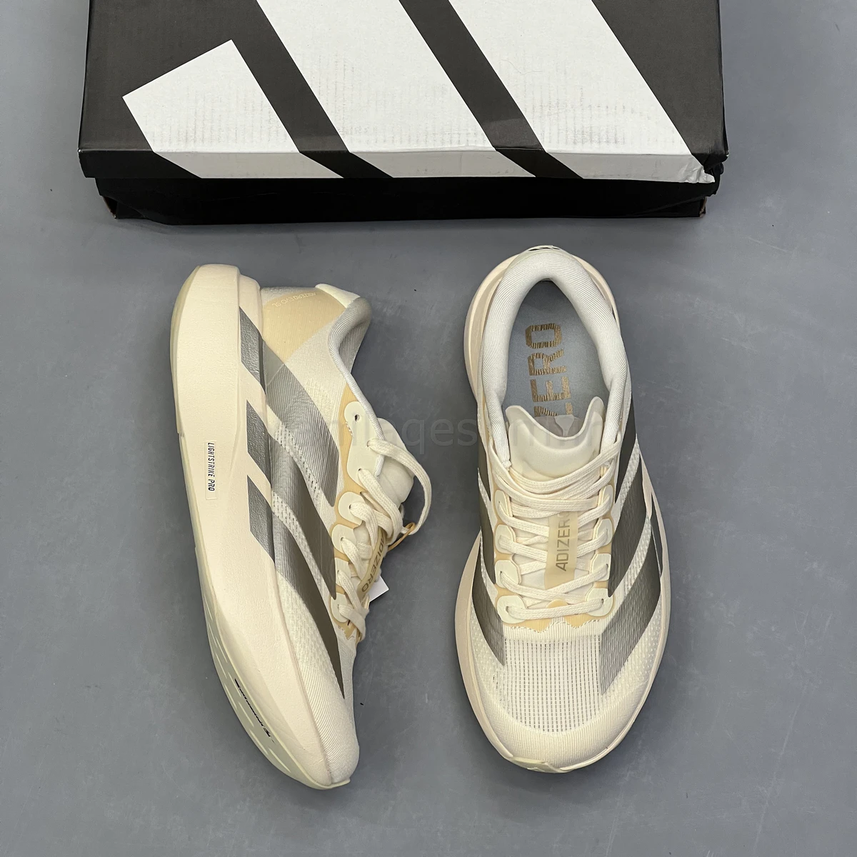 کفش آدیداس آدی زیرو کرم نقره ای Adidas Adizero Evo SL