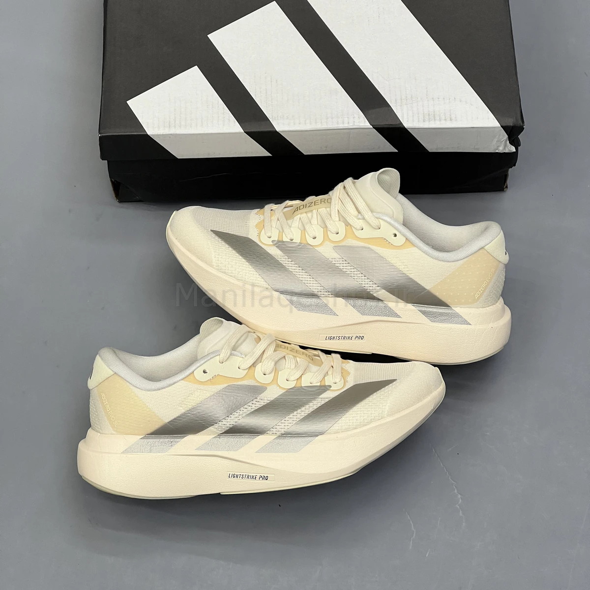 کفش آدیداس آدی زیرو کرم نقره ای Adidas Adizero Evo SL