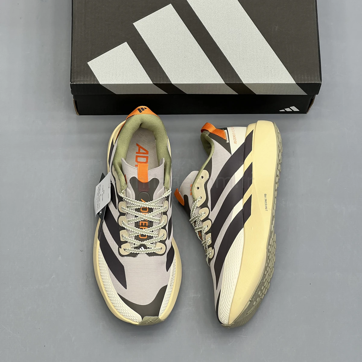 کفش آدیداس آدی زیرو طوسی کرم Adidas Adizero Evo SL ATR