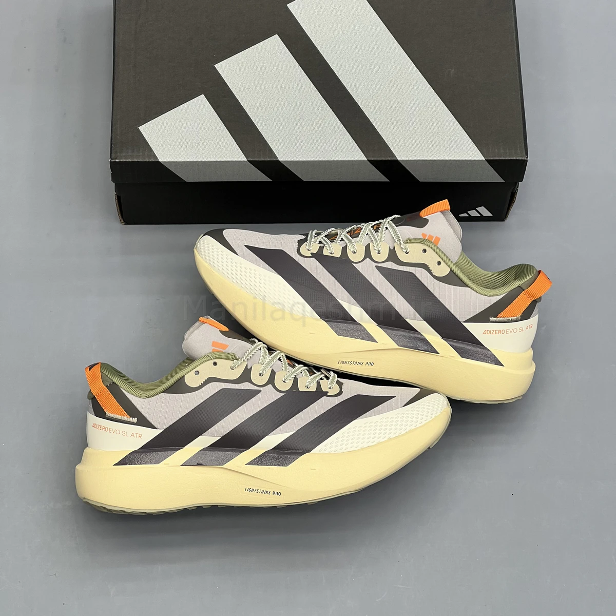 کفش آدیداس آدی زیرو طوسی کرم Adidas Adizero Evo SL ATR